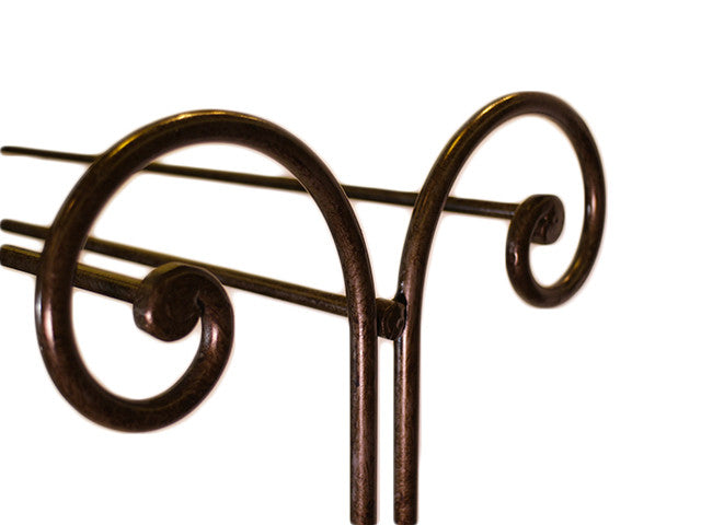 Wrought iron decorated towel holder